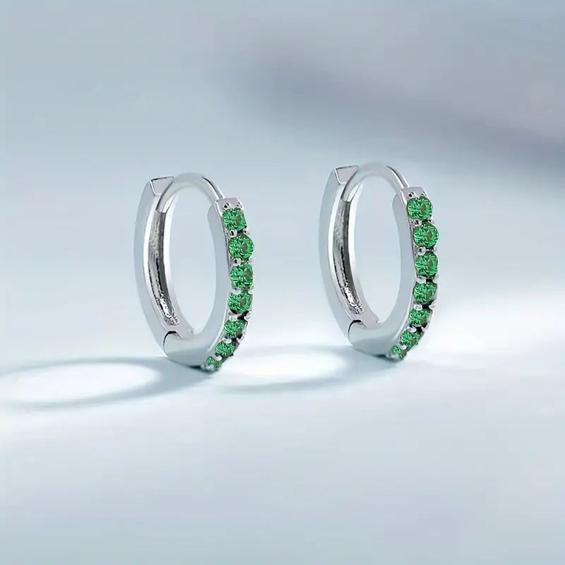 Pendientes colgantes de oro inspirados en la costa