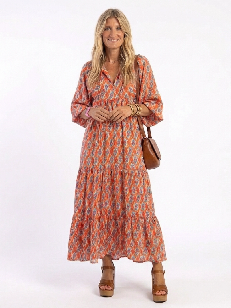 Amara | Vestido midi con escote en V y patrón geométrico