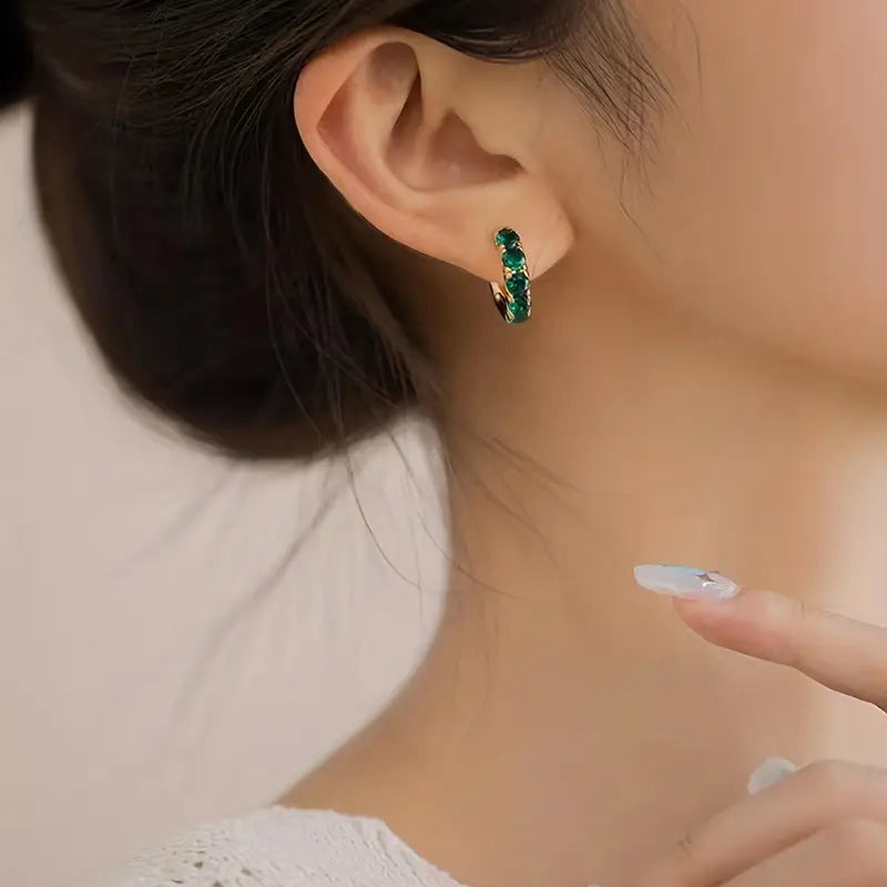 Pendientes colgantes de oro inspirados en la costa