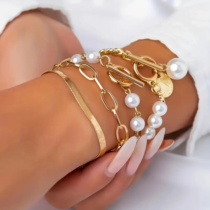 Conjunto de pulseras elegantes en oro (4 piezas) – serpiente, perlas y eslabones