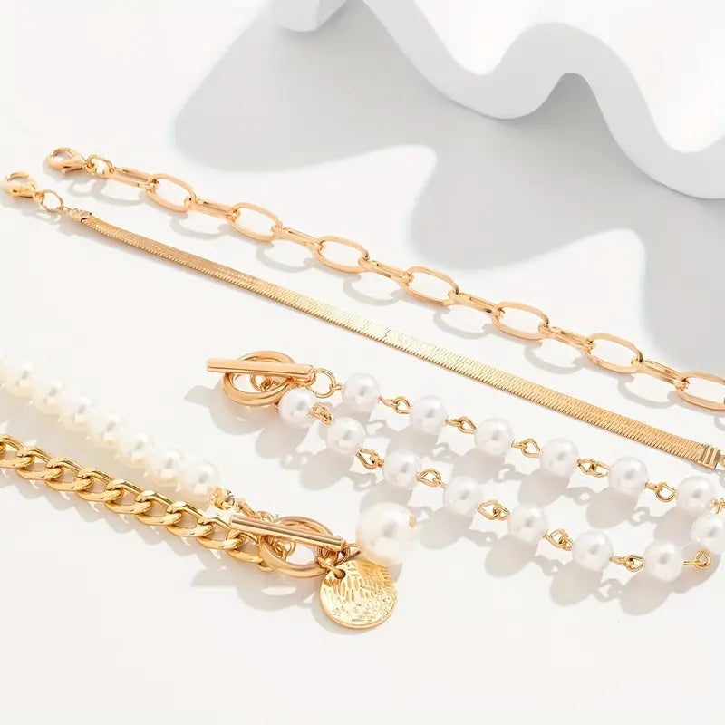 Conjunto de pulseras elegantes en oro (4 piezas) – serpiente, perlas y eslabones