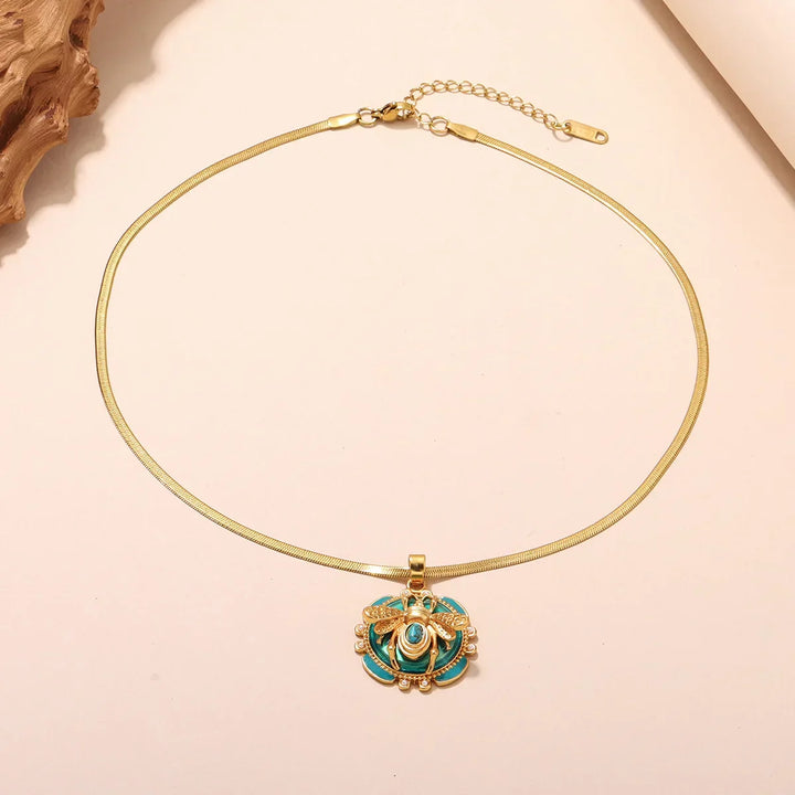 Péndulo de Oro Chic con Turquesa