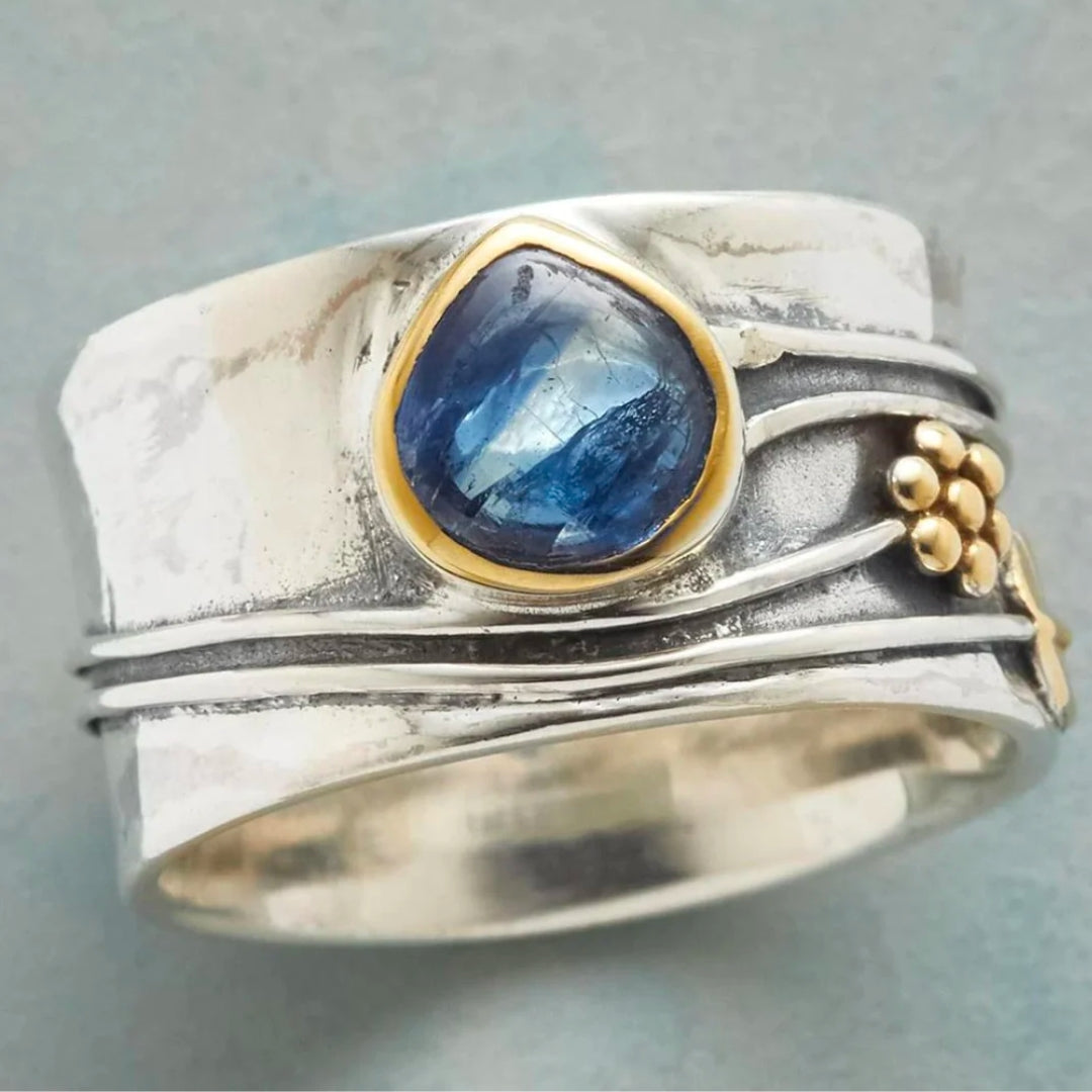 Anillo de plata vintage con cristal azul
