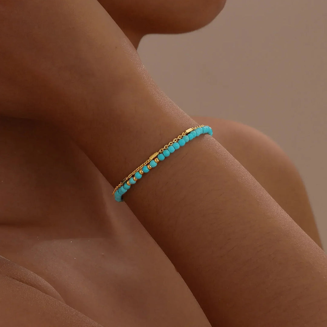 Pulsera doble en oro atemporal con turquesa