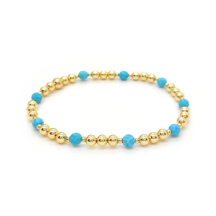 Pulsera de perlas de cruz vintage en turquesa
