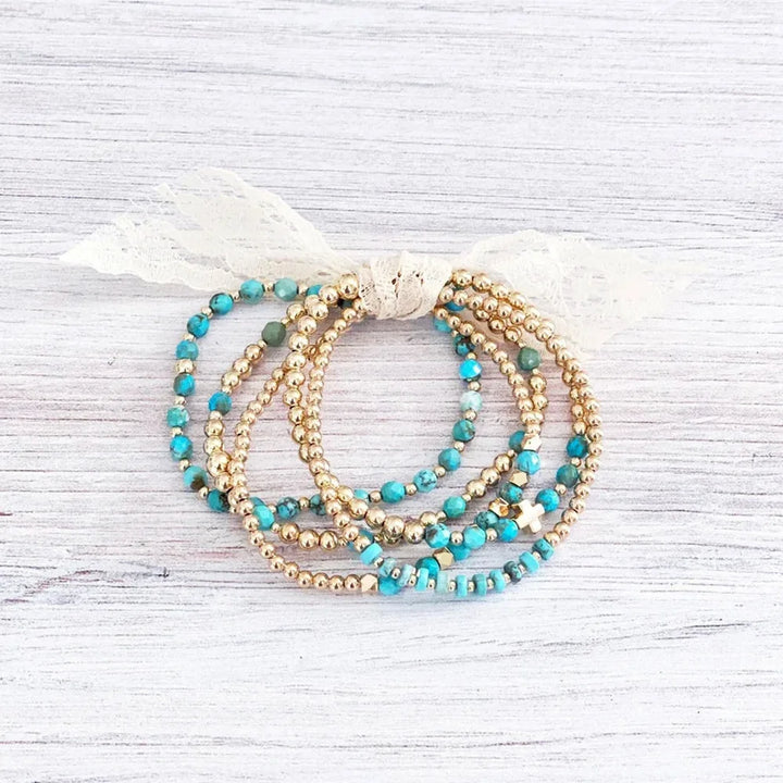 Pulsera de perlas de cruz vintage en turquesa
