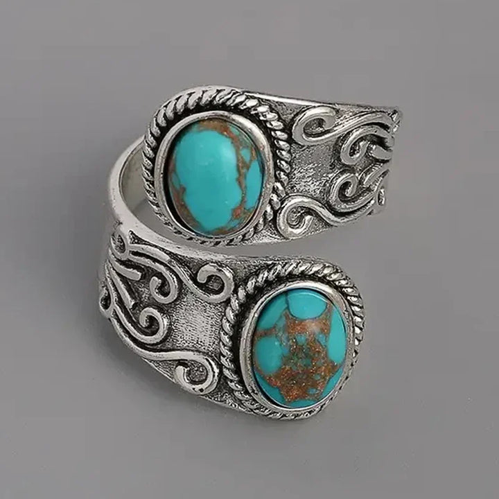 Anillo Cruzado Vintage Elegante en Turquesa