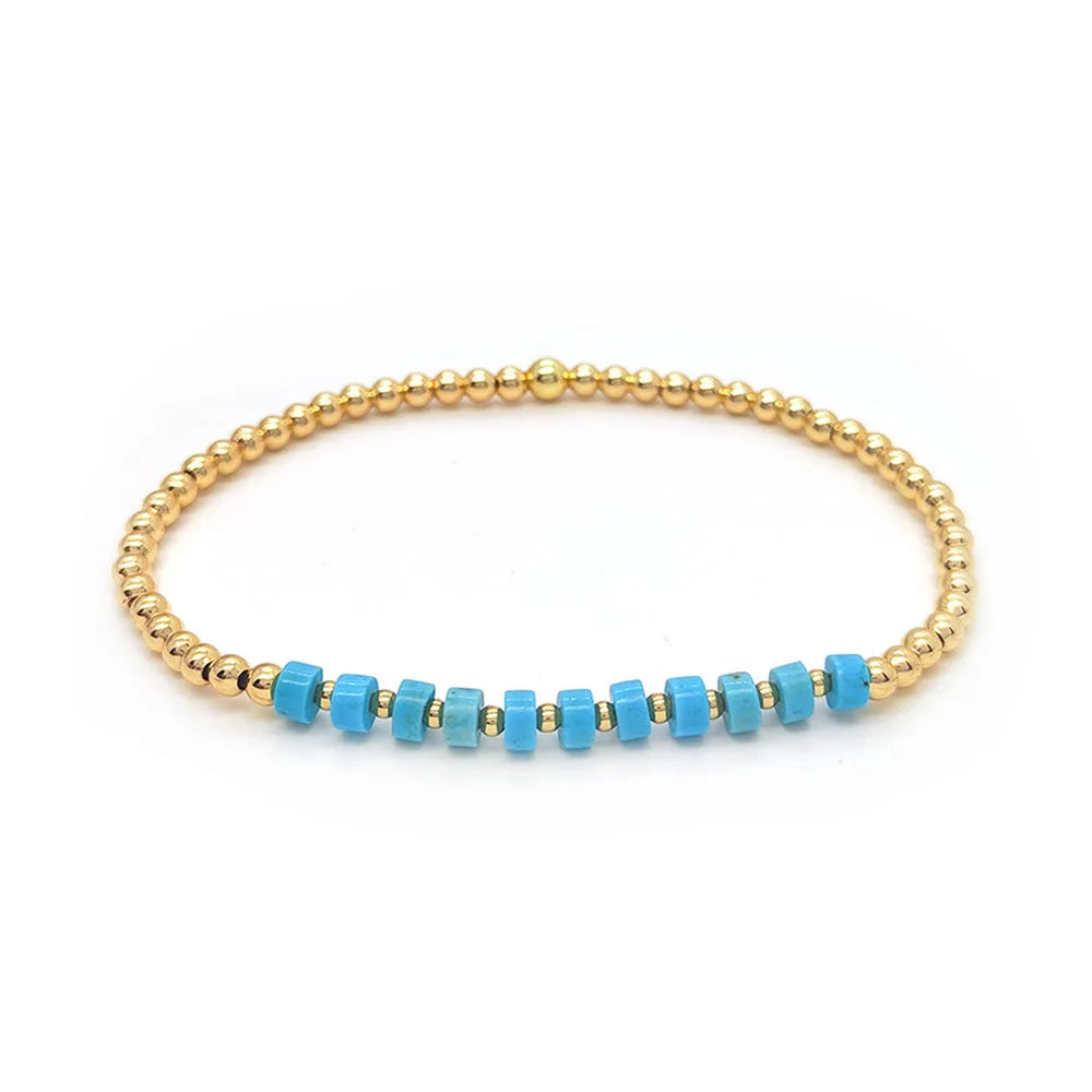 Pulsera de perlas de cruz vintage en turquesa