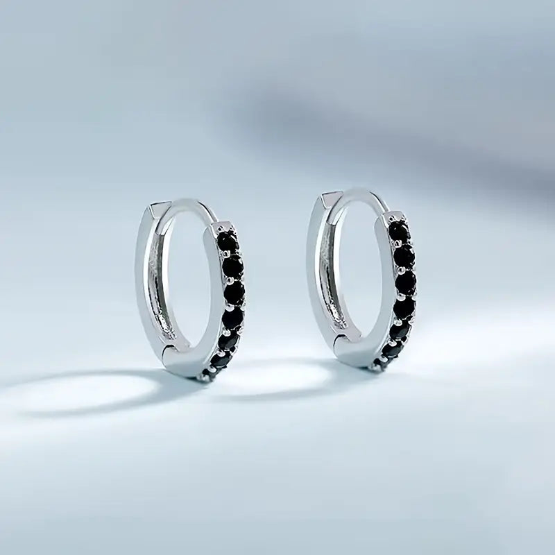 Pendientes colgantes de oro inspirados en la costa