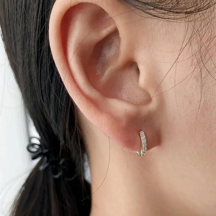 Pendientes colgantes de oro inspirados en la costa