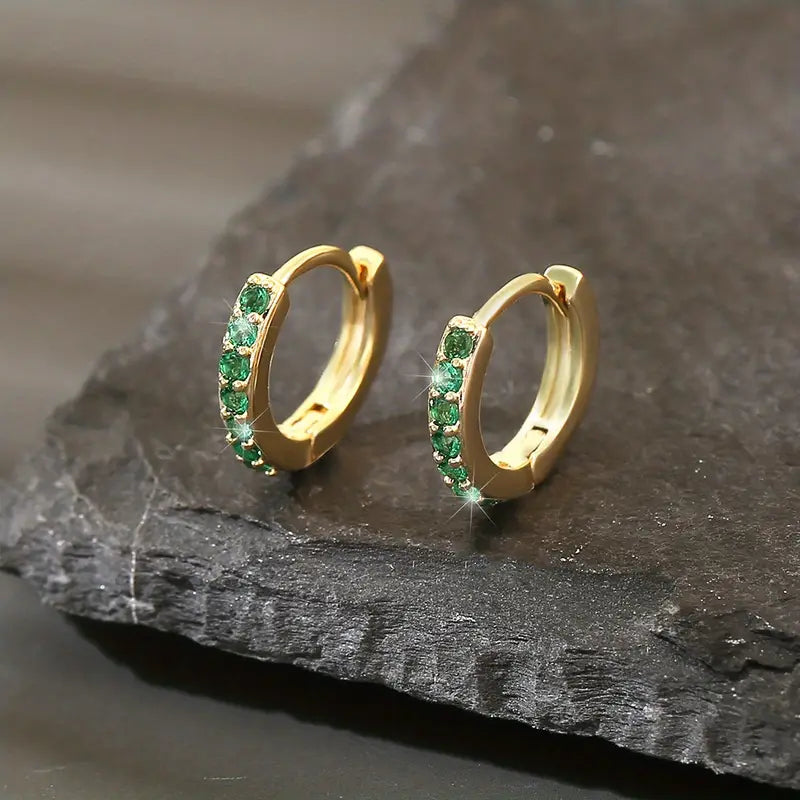 Pendientes colgantes de oro inspirados en la costa