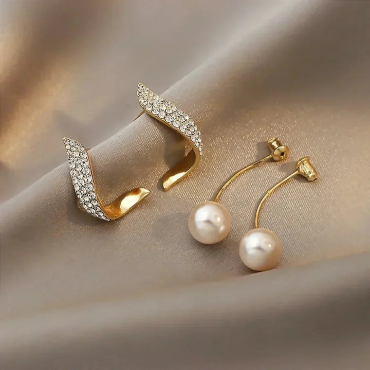 Pendientes de perlas de cristal y plumas