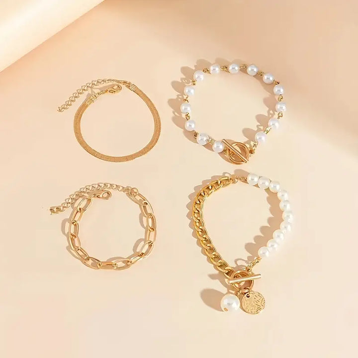 Conjunto de pulseras elegantes en oro (4 piezas) – serpiente, perlas y eslabones