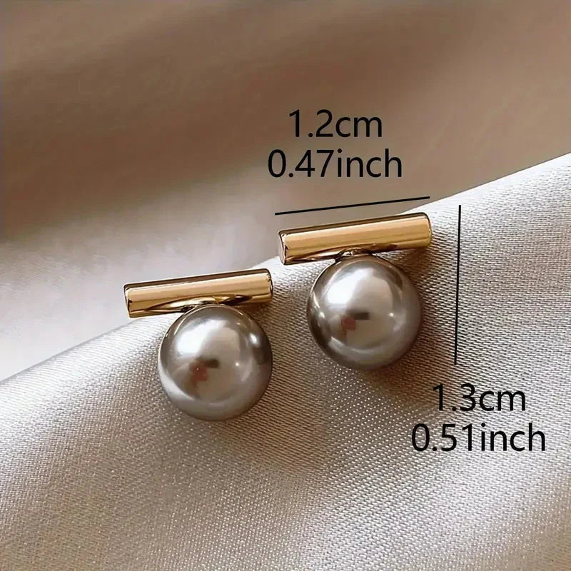 Pendientes de perlas negras