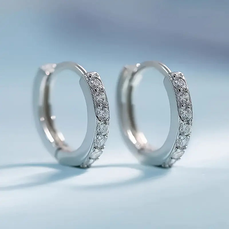 Pendientes colgantes de oro inspirados en la costa