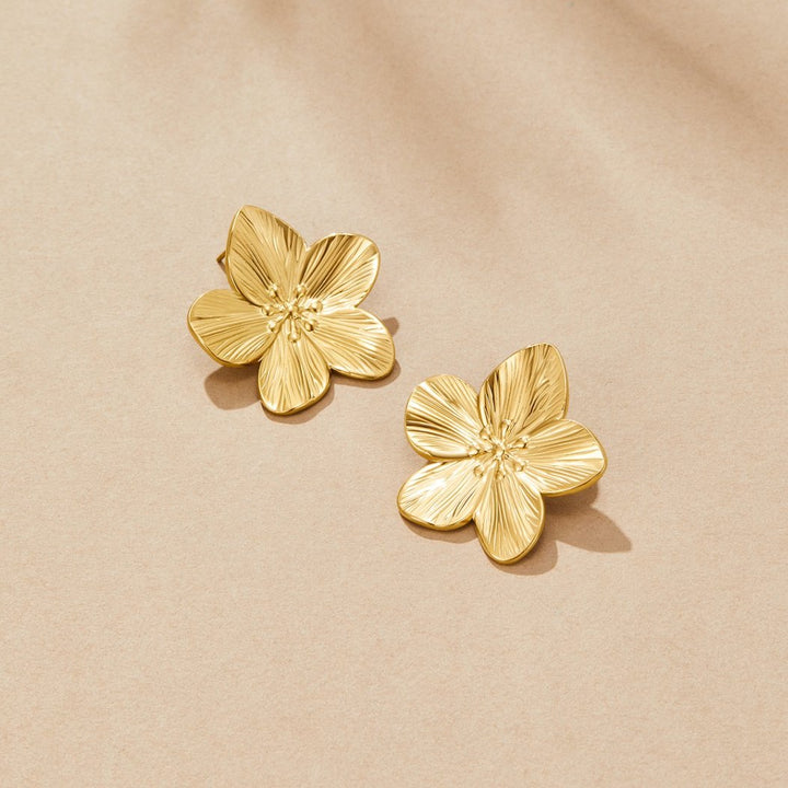 Pendientes de flor en oro