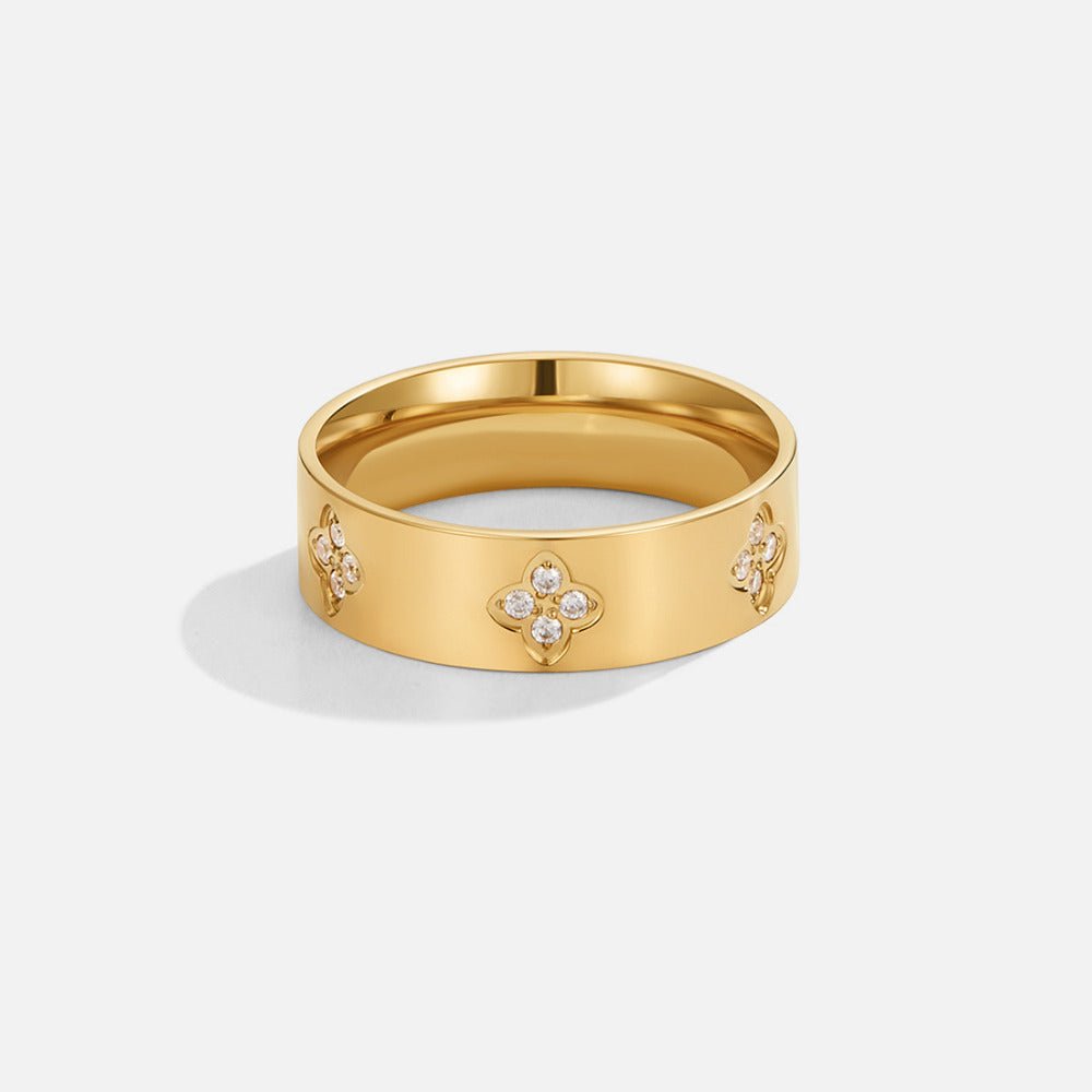 Anillo de trébol dorado con cristales