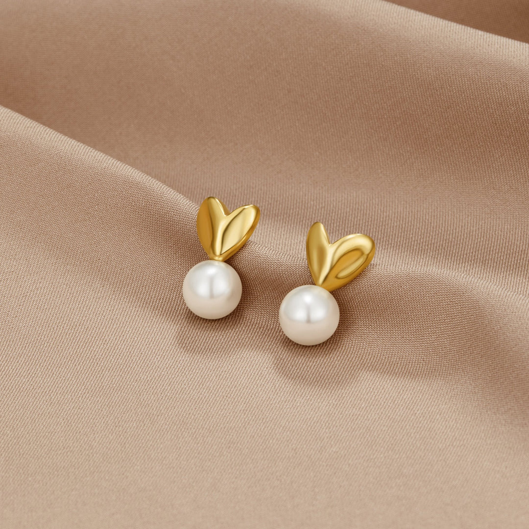 Pendientes en forma de corazón con perla